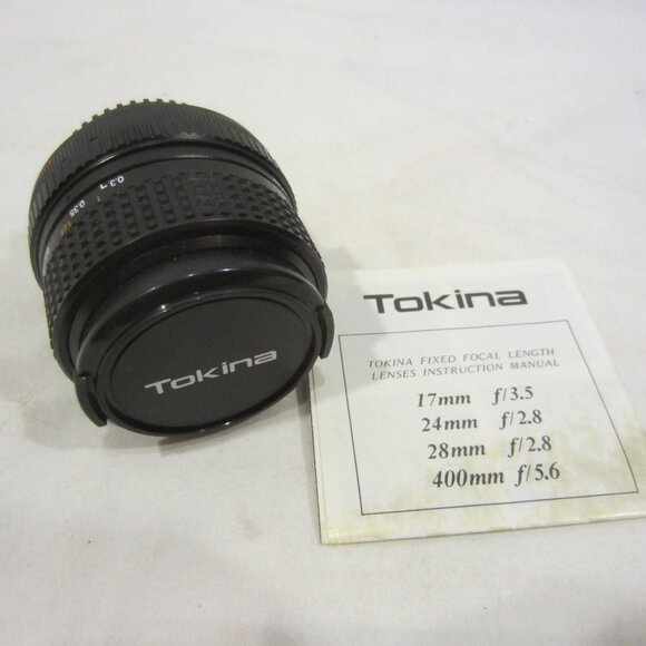 TOKINA 28mm 1:2.8 lens w/ Spectrum 7 49mm Skylight 1A filter